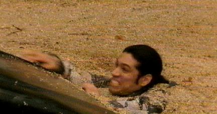 This is actually a really unimpressive picture. It needs to be an MPEG or something so you can see that it looks as if the guy is splashing around in a bathtub full of soggy cornflakes...